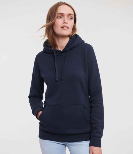 Model wearing the Russell Athletic Ladies Authentic Hooded Sweatshirt in French Navy