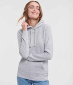Model wearing the Russell Athletic Ladies Authentic Hooded Sweatshirt in Light Oxford