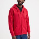 Model wearing the Uneek Classic Full Zip Hooded Sweatshirt in Red
