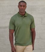 Henbury H475 Coolplus wicking piqué polo shirt in Olive Green, worn by a model
