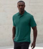 Henbury H475 Coolplus wicking piqué polo shirt in Teal, worn by a model