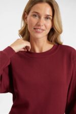 UC203 Uneek Classic Sweatshirt – Maroon (model, front close-up)