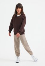 UC206 Uneek Childrens Classic V Neck Sweatshirt – Brown (model, front full length)